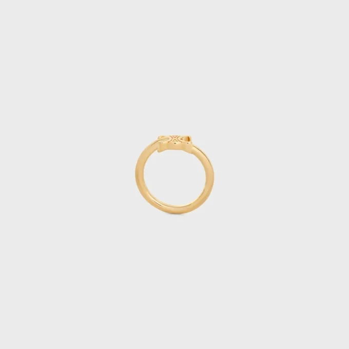 Anillo asimétrico Triomphe en latón con acabado dorado