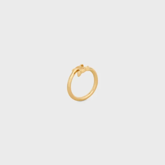 Anillo asimétrico Triomphe en latón con acabado dorado