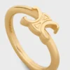 Anillo asimétrico Triomphe en latón con acabado dorado