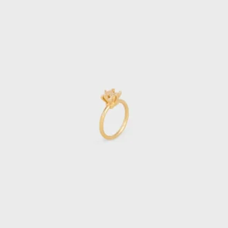Anillo solitario Triomphe con brillos de strass y latón con acabado dorado