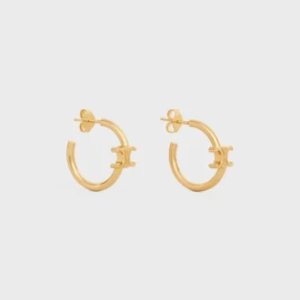 Aros asimétricos Triomphe en latón con acabado dorado