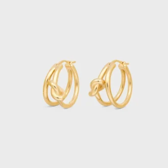 Aros dobles con nudo en latón con acabado dorado