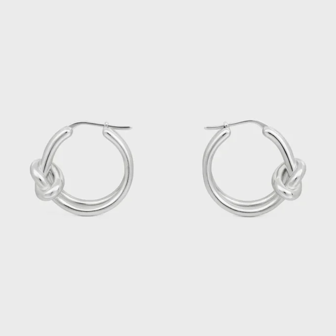 Aros dobles Knot en latón con acabado de rodio Aros dobles Knot en latón con acabado de rodio