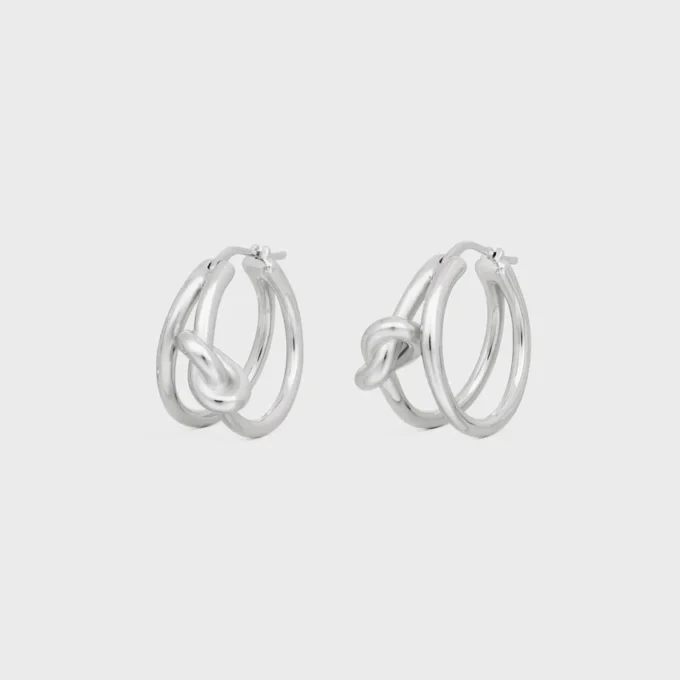 Aros dobles Knot en latón con acabado de rodio Aros dobles Knot en latón con acabado de rodio