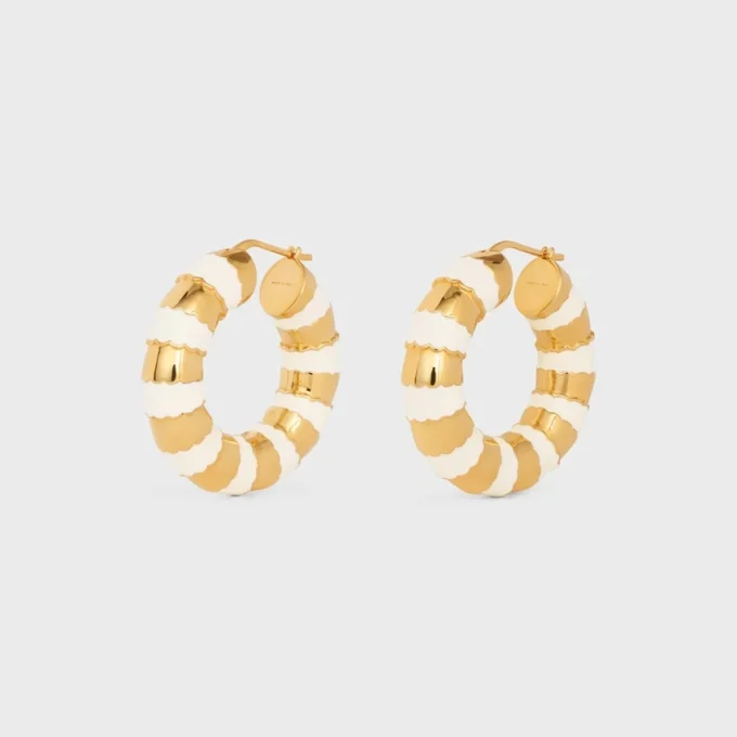 Aros esmerilados en esmalte y latón con acabado dorado Aros esmerilados en esmalte y latón con acabado dorado
