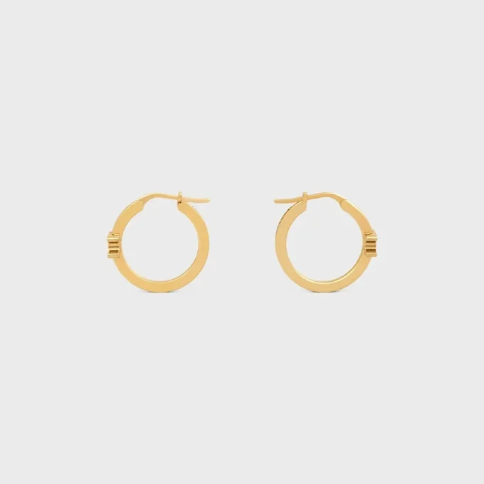 Aros Triomphe Sparkle en strass y latón con acabado dorado Aros Triomphe Sparkle en strass y latón con acabado dorado
