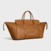 Big Smile Luggage en piel de becerro natural flexible
