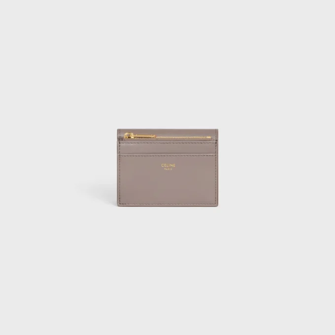 Billetera compacta con compartimento para monedas Triomphe en piel de becerro brillante Billetera compacta con compartimento para monedas Triomphe en piel de becerro brillante