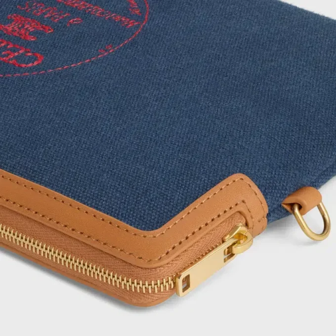 Bolsita con correa Cuir Triomphe en tela con bordado