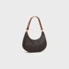 Bolso Ava en Triomphe Canvas y piel de becerro Bolso Ava en Triomphe Canvas y piel de becerro