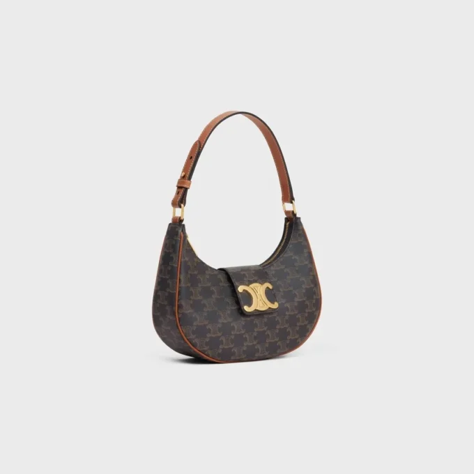 Bolso Ava Triomphe mediano en Triomphe Canvas y piel de becerro Bolso Ava Triomphe mediano en Triomphe Canvas y piel de becerro