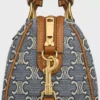 Bolso Boston pequeño en jacquard Triomphe y piel de becerro Bolso Boston pequeño en jacquard Triomphe y piel de becerro