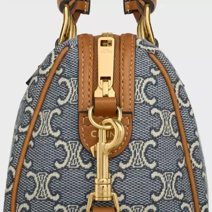 Bolso Boston pequeño en jacquard Triomphe y piel de becerro Bolso Boston pequeño en jacquard Triomphe y piel de becerro