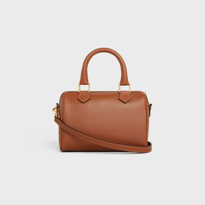 Bolso Boston pequeño en piel de becerro lisa Bolso Boston pequeño en piel de becerro lisa
