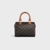 Bolso Boston pequeño en Triomphe Canvas y piel de becerro Bolso Boston pequeño en Triomphe Canvas y piel de becerro