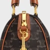 Bolso Boston pequeño en Triomphe Canvas y piel de becerro Bolso Boston pequeño en Triomphe Canvas y piel de becerro