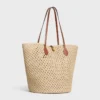 Bolso Bucket Triomphe Beads Basket en rafia y piel de becerro Bolso Bucket Triomphe Beads Basket en rafia y piel de becerro