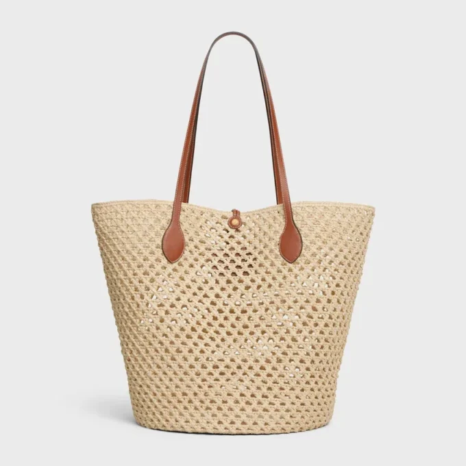 Bolso Bucket Triomphe Beads Basket en rafia y piel de becerro Bolso Bucket Triomphe Beads Basket en rafia y piel de becerro