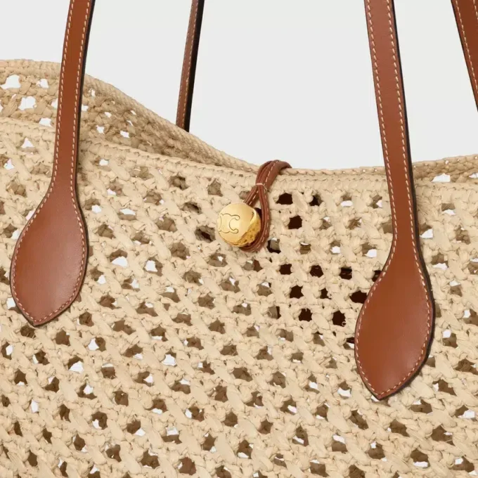 Bolso Bucket Triomphe Beads Basket en rafia y piel de becerro Bolso Bucket Triomphe Beads Basket en rafia y piel de becerro