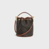 Bolso Clara en Triomphe Canvas y piel de becerro Bolso Clara en Triomphe Canvas y piel de becerro