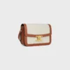 Bolso Classique Triomphe en tejido con estampado Triomphe integral y piel de becerro Bolso Classique Triomphe en tejido con estampado Triomphe integral y piel de becerro