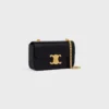 Bolso de hombro con cadena Claude en lagarto Bolso de hombro con cadena Claude en lagarto
