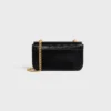 Bolso de hombro con cadena Claude en lagarto Bolso de hombro con cadena Claude en lagarto