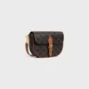 Bolso de hombro Folco en Triomphe Canvas y piel de becerro Bolso de hombro Folco en Triomphe Canvas y piel de becerro