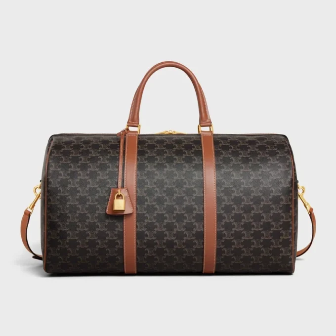 Bolso de viaje grande en Triomphe Canvas y piel de becerro Bolso de viaje grande en Triomphe Canvas y piel de becerro