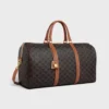 Bolso de viaje grande en Triomphe Canvas y piel de becerro Bolso de viaje grande en Triomphe Canvas y piel de becerro