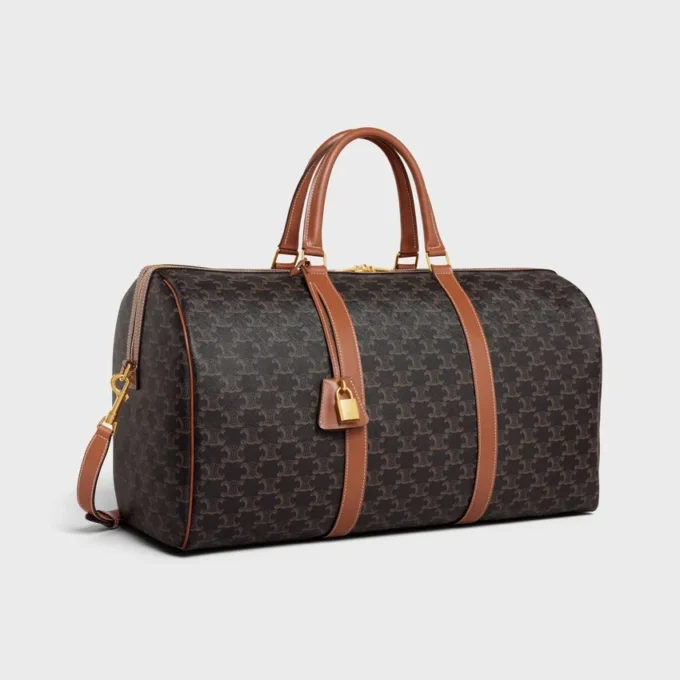 Bolso de viaje grande en Triomphe Canvas y piel de becerro Bolso de viaje grande en Triomphe Canvas y piel de becerro