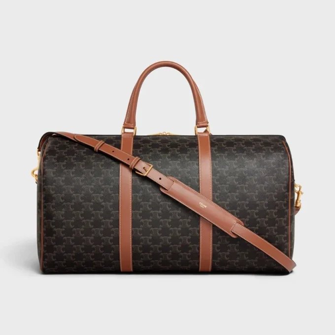 Bolso de viaje grande en Triomphe Canvas y piel de becerro Bolso de viaje grande en Triomphe Canvas y piel de becerro