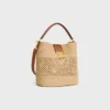Bolso Louise mediano de rafia y piel de becerro Bolso Louise mediano de rafia y piel de becerro