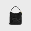 Bolso Louise mediano de rafia y piel de becerro Bolso Louise mediano de rafia y piel de becerro