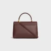 Bolso Nino mediano en piel de becerro granulada y flexible