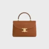 Bolso Nino mediano en piel de becerro nobuk