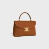 Bolso Nino mediano en piel de becerro nobuk