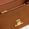 Bolso Nino mediano en piel de becerro nobuk