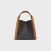 Bolso pequeño tipo cubo en Triomphe Canvas y piel de becerro natural Bolso pequeño tipo cubo en Triomphe Canvas y piel de becerro natural