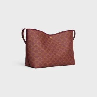 Bolso shopper blando en Triomphe Canvas y piel de becerro
