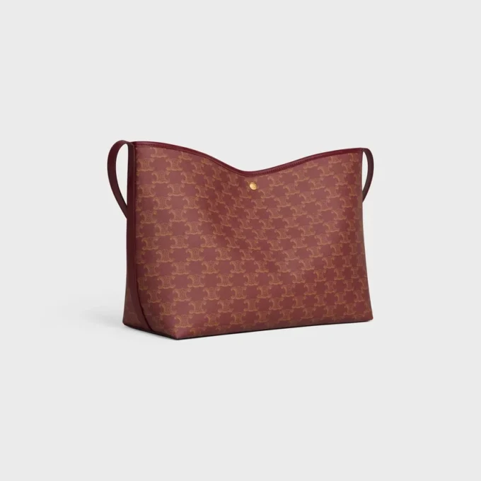 Bolso shopper blando en Triomphe Canvas y piel de becerro Bolso shopper blando en Triomphe Canvas y piel de becerro