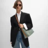Bolso shopper blando en Triomphe Canvas y piel de becerro Bolso shopper blando en Triomphe Canvas y piel de becerro