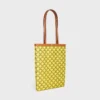 Bolso shopper plano mediano en Triomphe Canvas