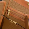 Bolso shopper plano mediano en Triomphe Canvas