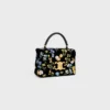 Bolso Teen Nino de terciopelo con bordado floral Bolso Teen Nino de terciopelo con bordado floral