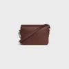 Bolso Teen Triomphe en piel de becerro brillante