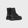 Bota gruesa con cordones de CELINE en nailon y piel de toro brillante Bota gruesa con cordones de CELINE en nailon y piel de toro brillante