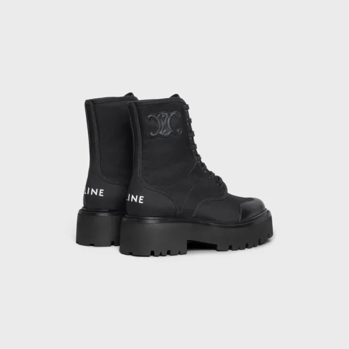 Bota gruesa con cordones de CELINE en nailon y piel de toro brillante Bota gruesa con cordones de CELINE en nailon y piel de toro brillante