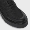 Bota gruesa con cordones de CELINE en nailon y piel de toro brillante Bota gruesa con cordones de CELINE en nailon y piel de toro brillante