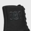 Bota gruesa con cordones de CELINE en nailon y piel de toro brillante Bota gruesa con cordones de CELINE en nailon y piel de toro brillante